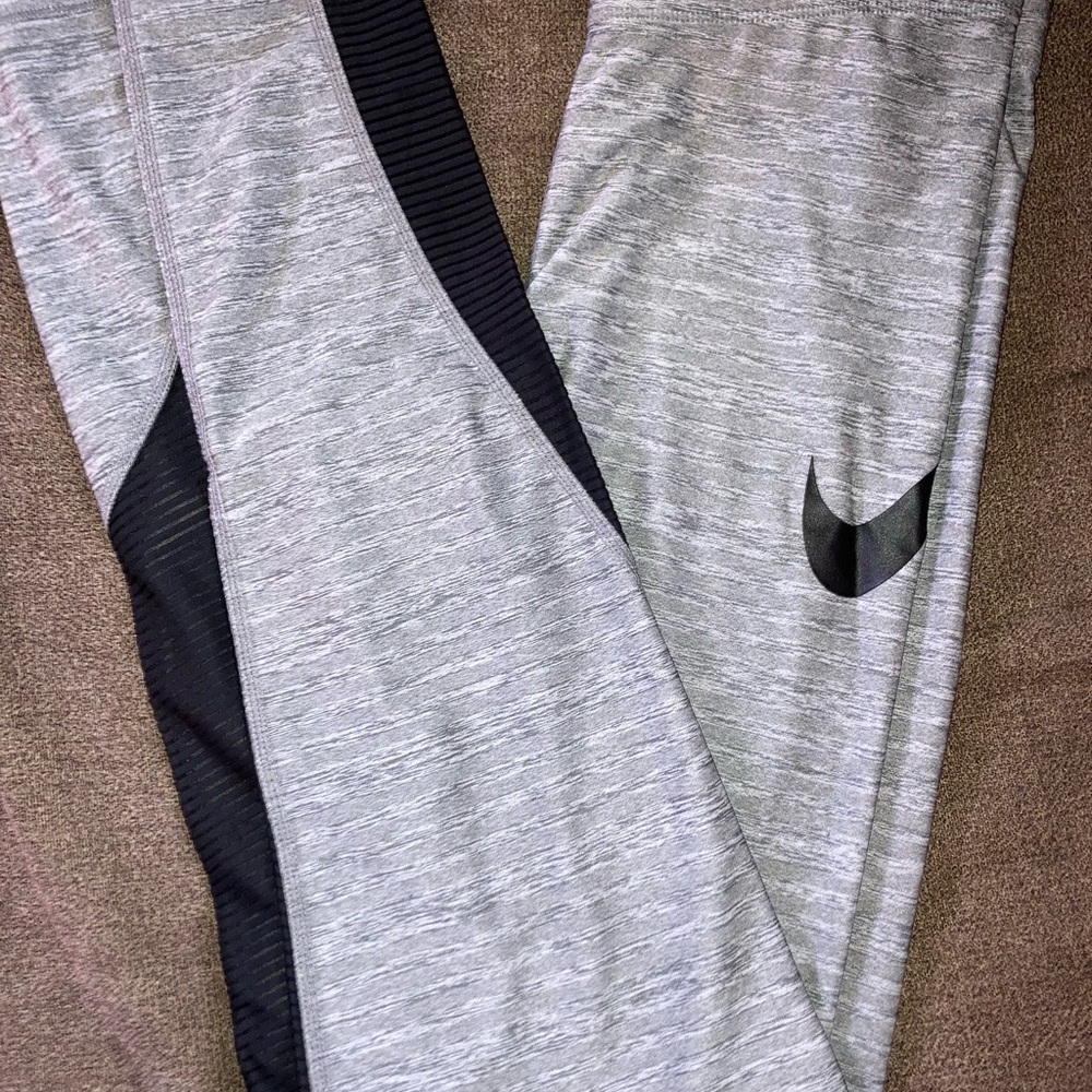 Nike Kids woman’s Gray Heather Leggings with Black Swoosh